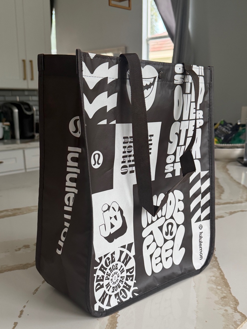 Lululemon Brown and White Graphic Tote Long black shoulder straps.

16 x 14